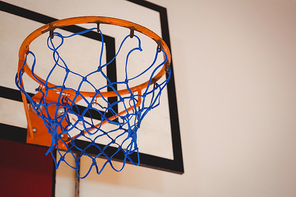 Low angle view of blue basket ball hoop in court