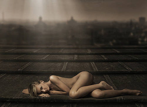 Beautiful naked woman laying