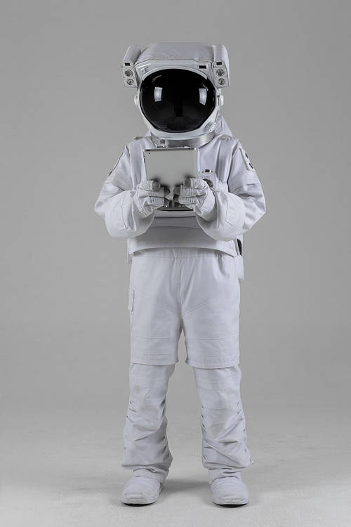 Space Life-Astronaut looking at a tablet
