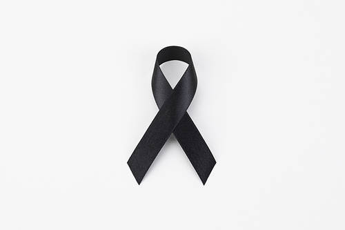 Ribbon Image - Image of a black ribbon placed over a white background