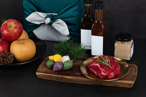 Holiday gift set_Apple and pear fruits, Chuseok related supplies, songpyeon, meat, and gifts wrapped in furoshiki Top view image photo