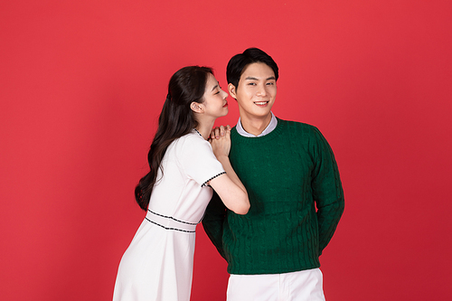 Christmas shopping event concept photo image of woman whispering to man