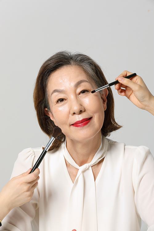Senior woman_color makeup and cosmetics