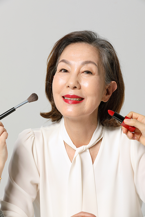Senior woman_color makeup and cosmetics