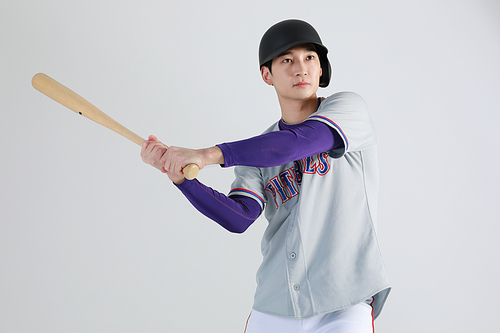 Sports_Photography of a baseball batter holding a bat