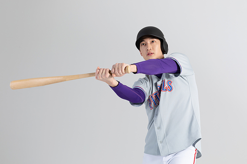 Sports_Photography of a baseball batter holding a bat