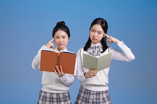 Kids these days_Photo image of students struggling with books