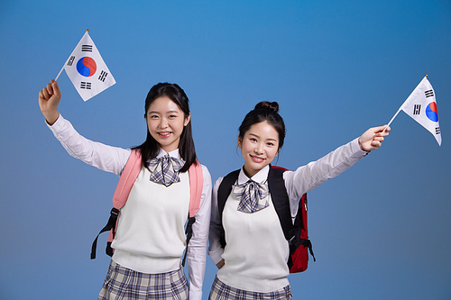 Kids these days_Photo image of students holding Taegeukgi