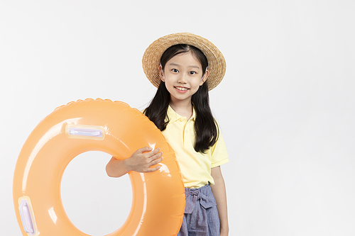 Photo image of child_holding a tube