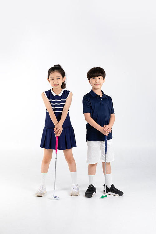 Photo image of a child_holding a golf club