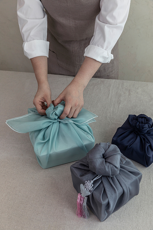 Holiday gift object_hands motion wrapping furoshiki