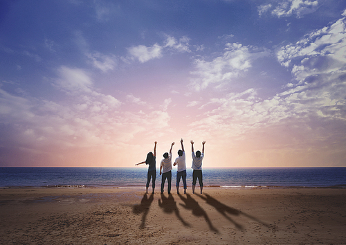 Dream and Hope Vision_Graphic composite edited image of young people posing in the same pose on the beach