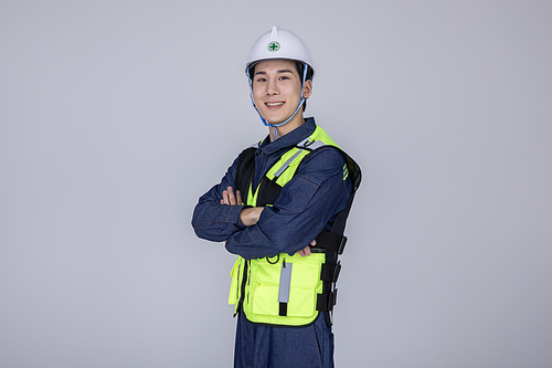 MZ Expert_Photo image of a field worker standing with his arms crossed