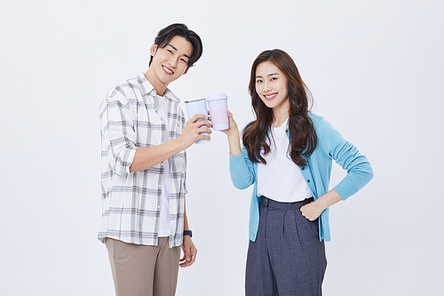 Youth Startup _ A photo image of a man and a woman holding a cup of water while preparing for a youth startup