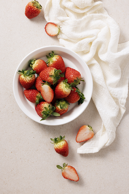 Fresh strawberries on and off the plate