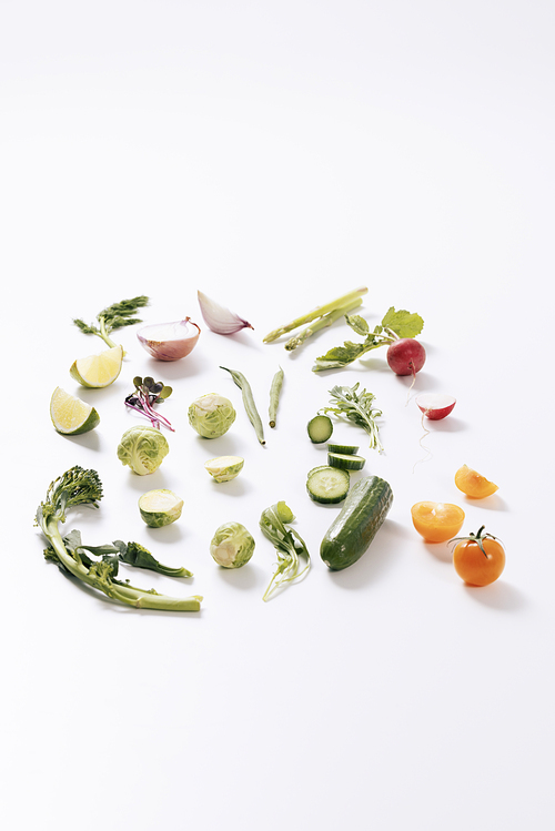 Fresh salad vegetable ingredients with white background