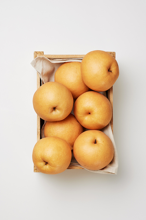 Pears packed in a wooden box