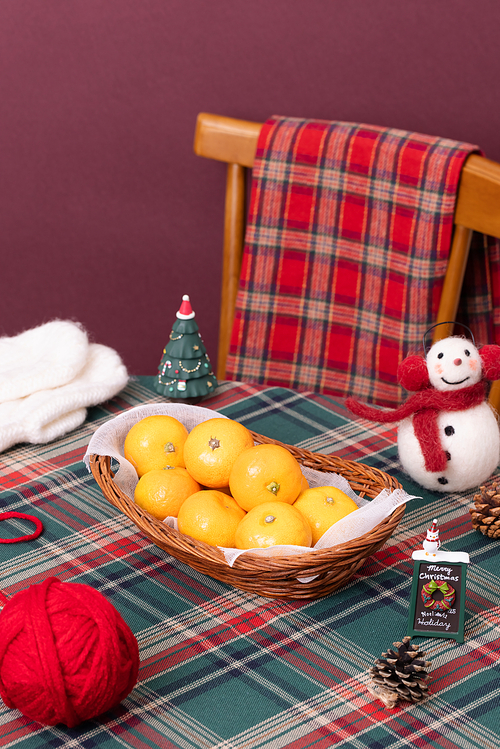 Tangerines plated with a Christmas concept
