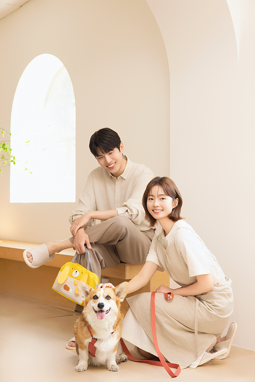 A happy couple with their dog