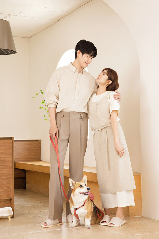 A happy couple with their dog
