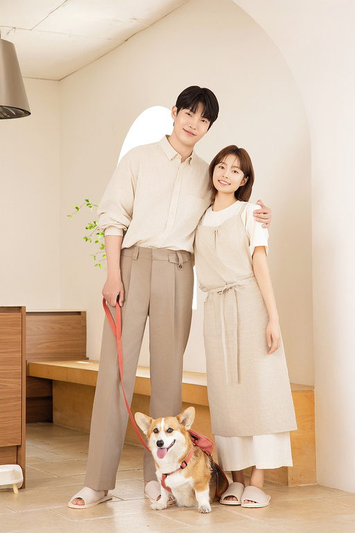 A happy couple with their dog