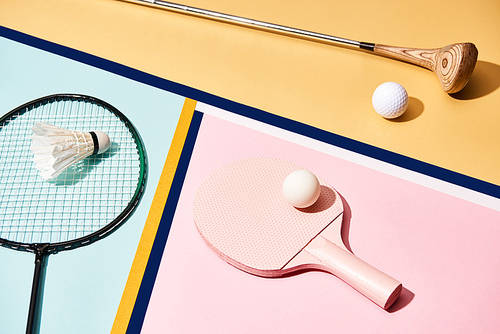 Equipment for badminton, golf and table tennis on colorful background with lines